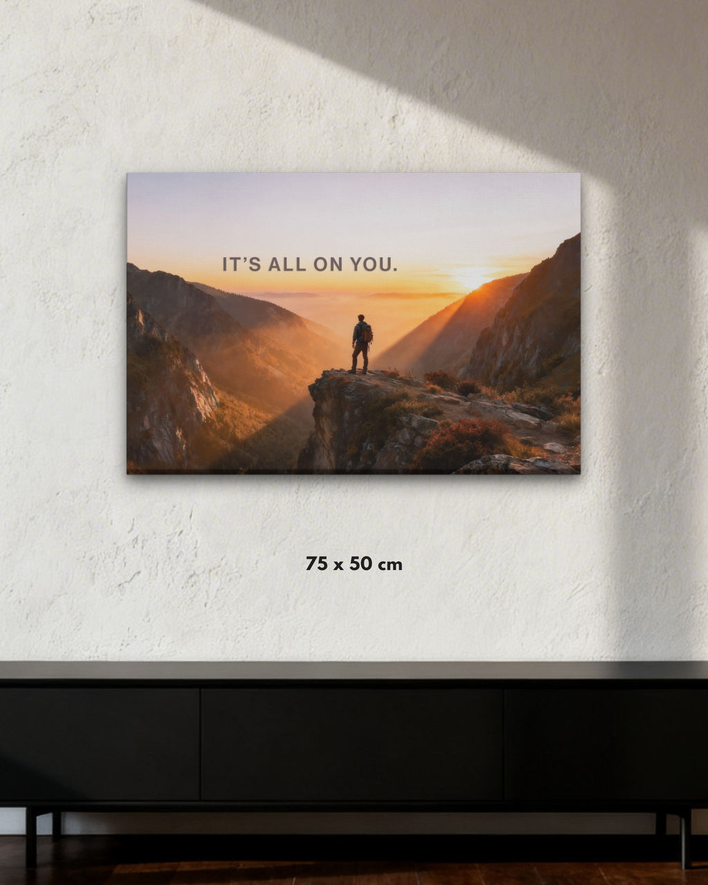 Statement-Wandbild gefertigt auf Leinwand mit dem Statement "IT'S ALL ON YOU." in der Größe 75x50 cm.